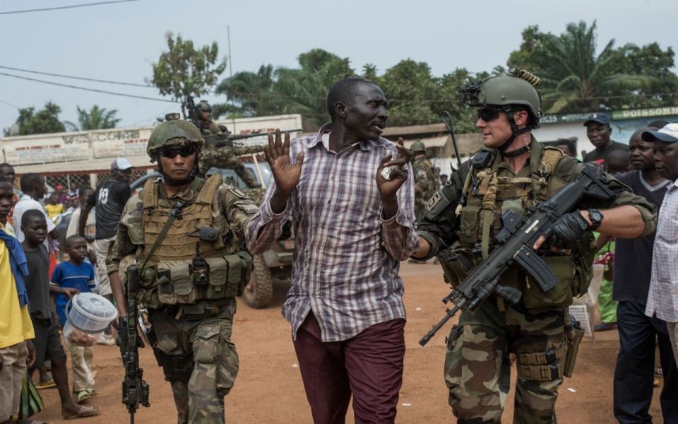 French soldiers arrest an alleged member of Seleka who was denounced by residents of Combattant neighborhood near Bangui s airport on December 9 2013 Source Getty Images 