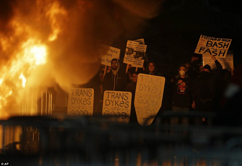 11 f10da00000578 4182824 protestors watch a fire on sproul plaza during a rally against t a 19 1486015156898 1486025849