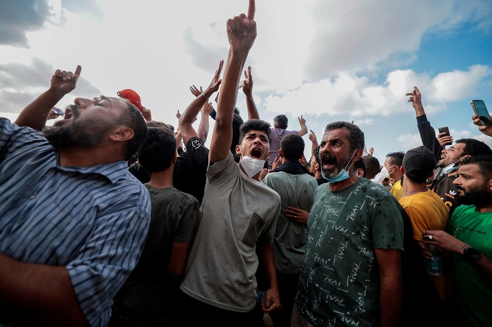 9 2023 09 18T162540Z 924974123 RC23B3AT8E1P RTRMADP 3 LIBYA STORM DERNA PROTEST 1695055599